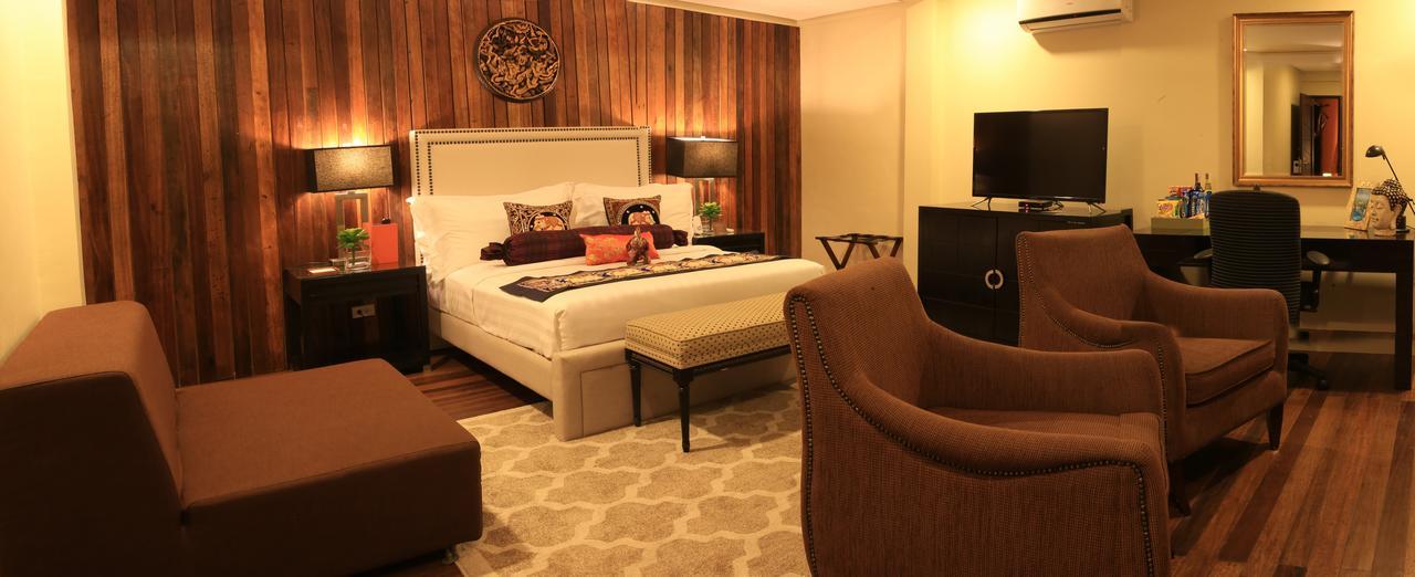 The Oriental Luxury Suites Alfonso Chambre photo